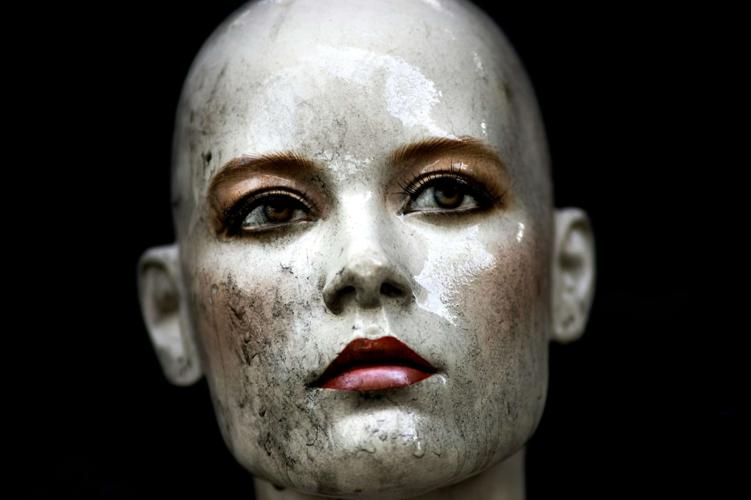A humorous photo showing a failed smokey eye attempt with blotchy eyeshadow.