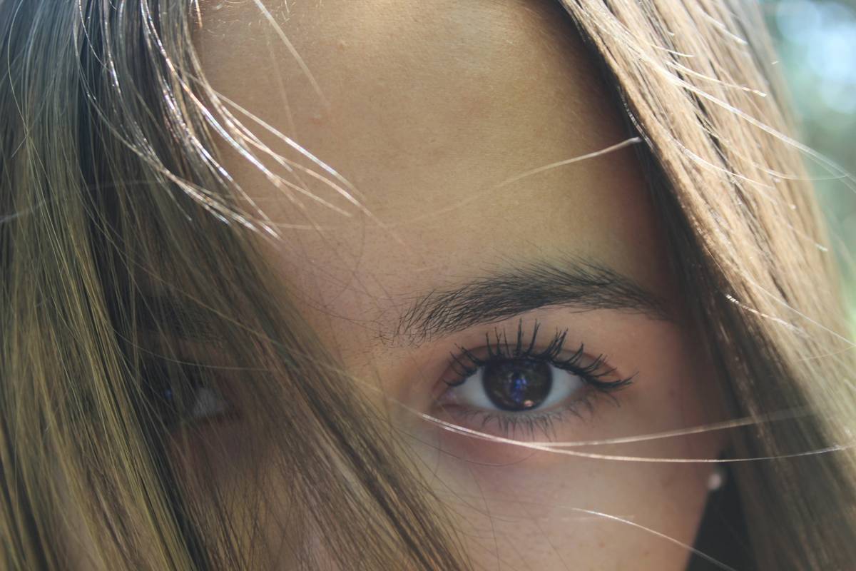 A close-up image showing skincare application steps including cleansing, toning, and moisturizing.