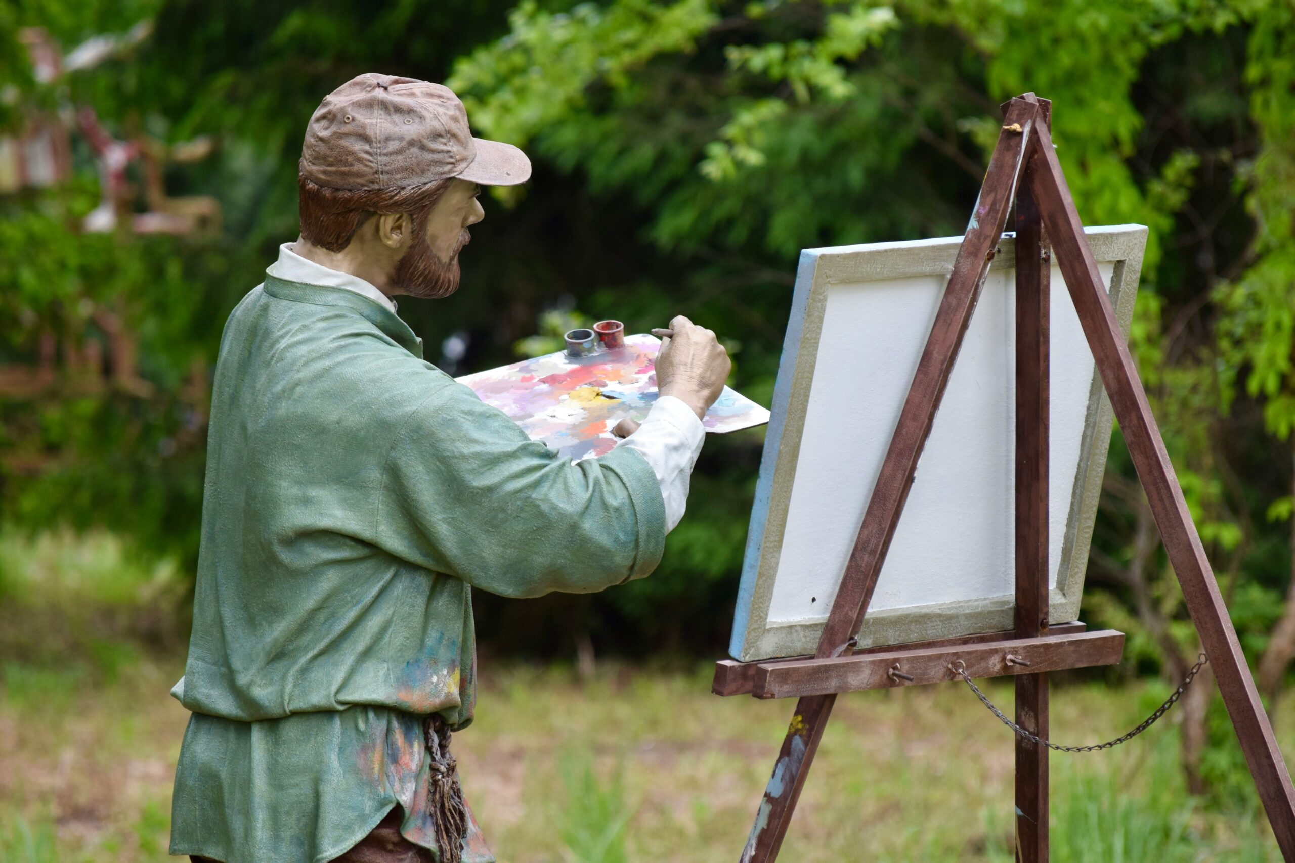 A sculpture of an artist at the Grounds for Sculptures in New Jersey.